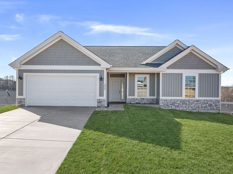 New-construction ranch home with board-and-batten siding